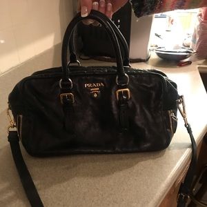 Prada purse worn with signs of wear